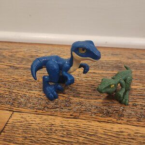Fisher-Price Imaginext Jurassic World Raptor and Mattel Camp Cretaceous Raptor